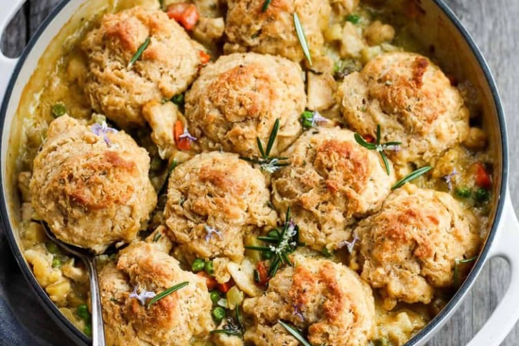 herby chicken pot pie with easy biscuit crust offers an elevated twist on the classic casserole