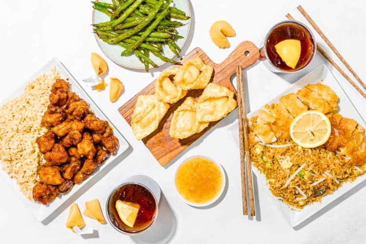 A selection of Chinese dishes and appetizers on a table