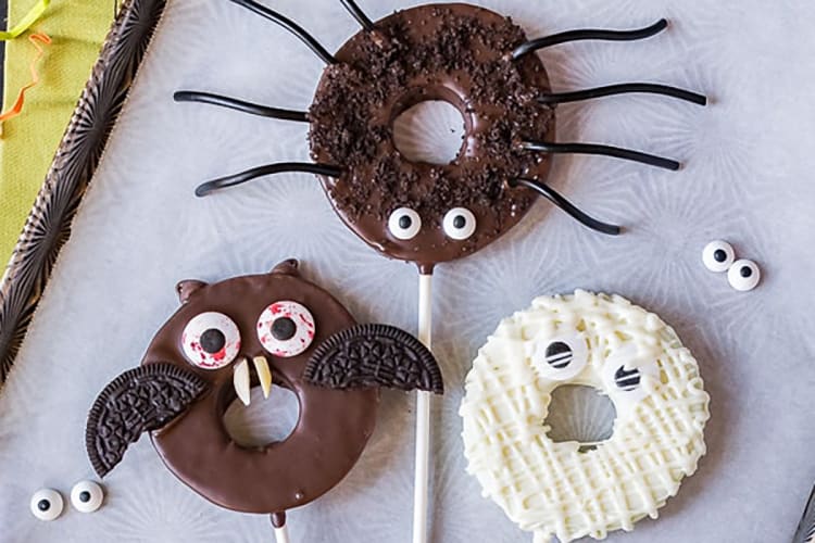 chocolate dipped halloween apple rings are a festive healthy halloween dessert