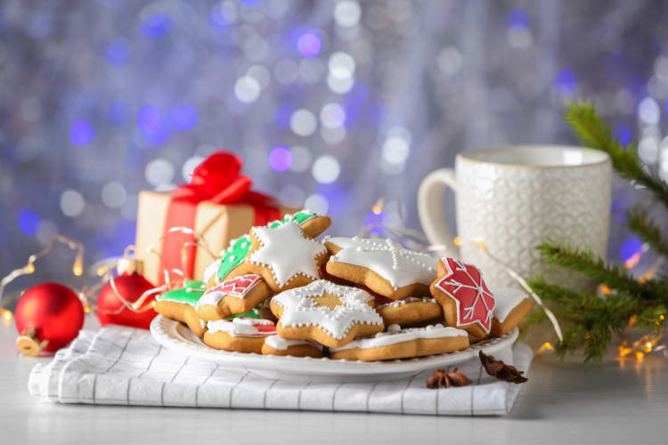Frosted star-shaped cookies on a plate
