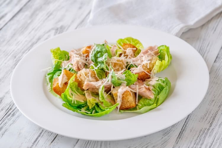 Chicken Caesar on a white plate