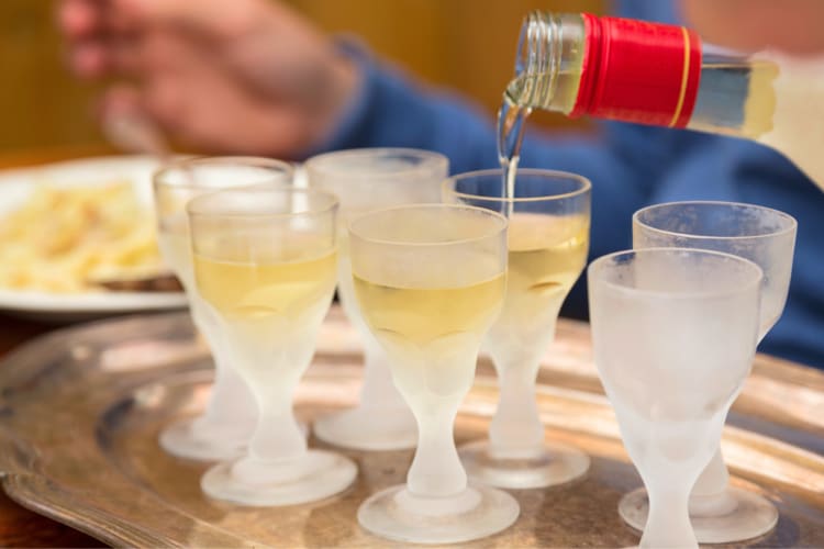 Pouring Akvavit a Copenhagen Food