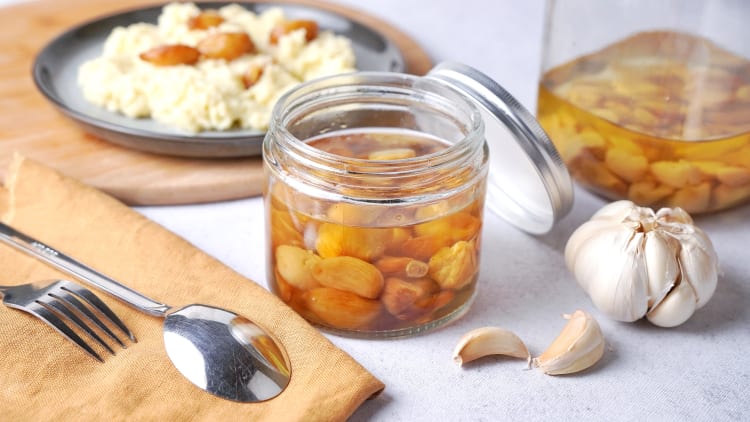 garlic confit is a savory and mellow vegan christmas appetizer