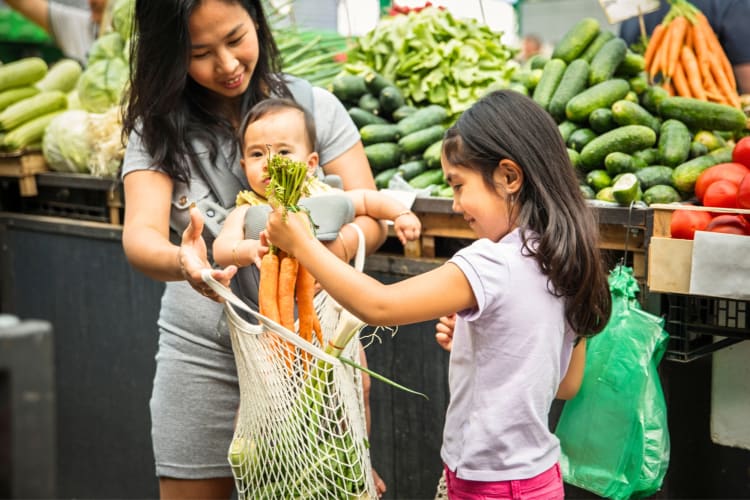 Shopping at the farmers market is one of the fun things to do in Dallas with kids