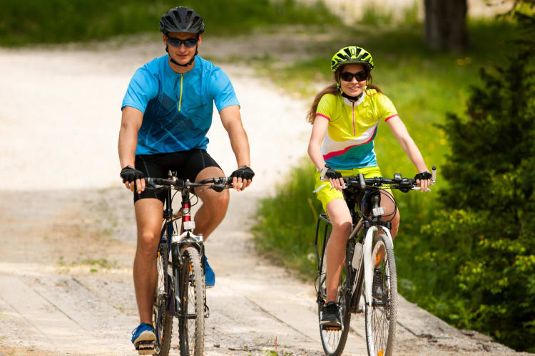 A couple riding bikes