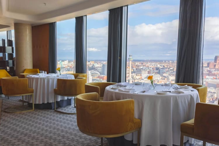 Restaurant seating with panoramic views of the city at Panoramic 34.