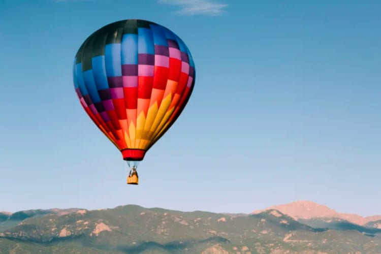 A colorful hot air balloon in the sky