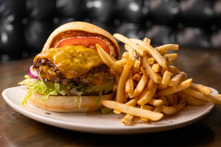 A cheeseburger and fries