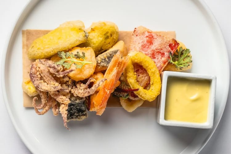 Deep fried seafood and vegetable dish fritto misto