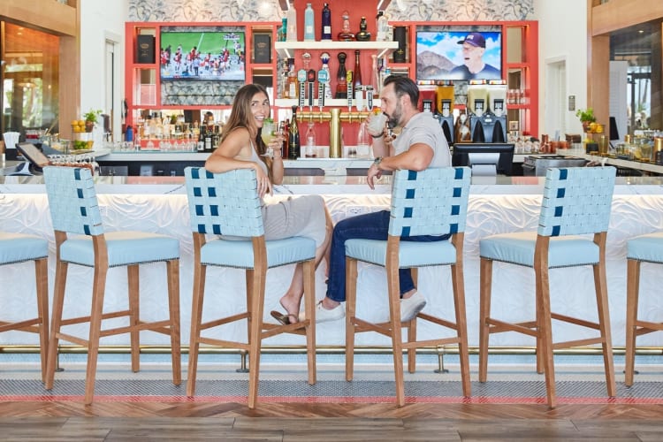 A day at a beach club is one of the laid-back date ideas in Orange County