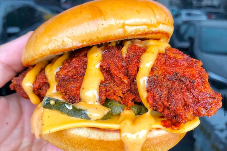 A Dave's Hot Chicken secret menu sandwich with extra cheese