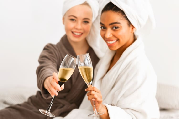 Two women at the spa with champagne flutes