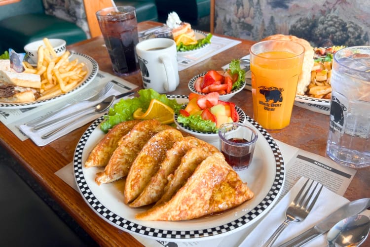 A selection of breakfast food and drinks on a table