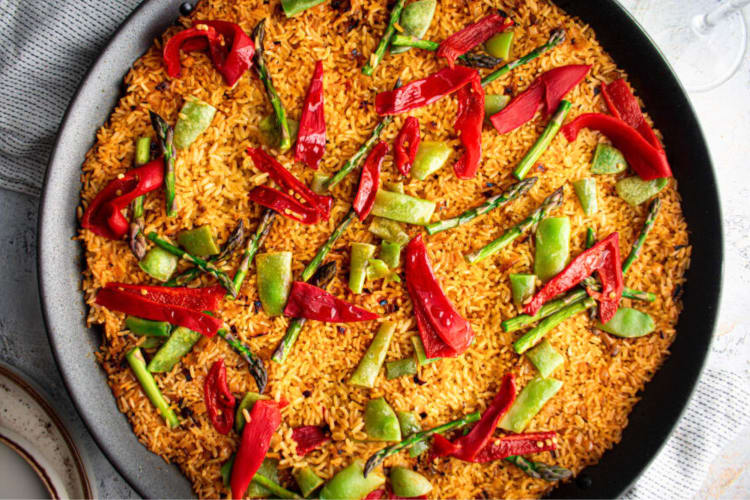 Making vegan paella is a great dinner party idea for plant-based guests