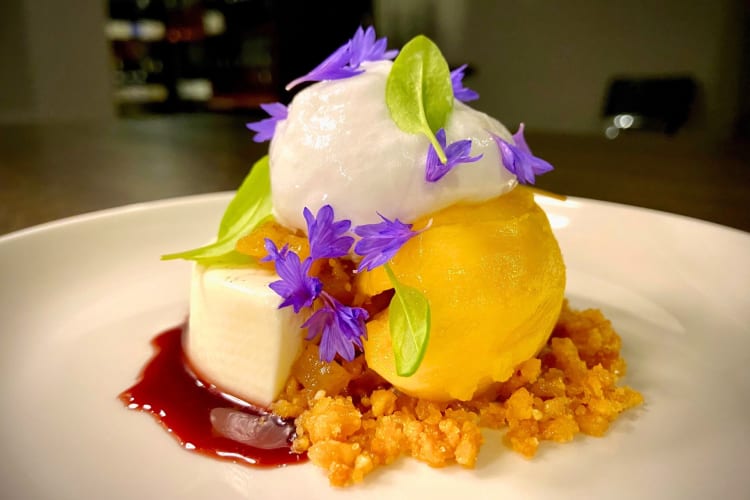 A dessert with edible flowers