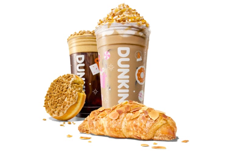 Two iced coffee drinks, a donut and an almond croissant