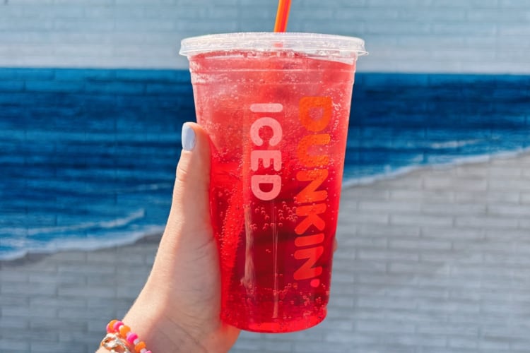 A Dunkin' Donuts pink iced tea drink