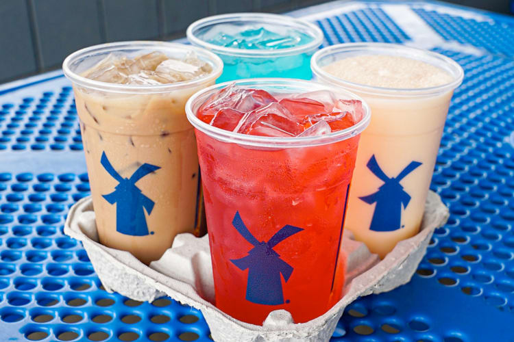 Dutch Bros Rebels and coffees on a table