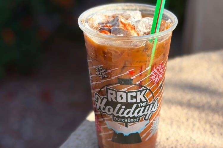 A coffee with chocolate syrup and whipped cream