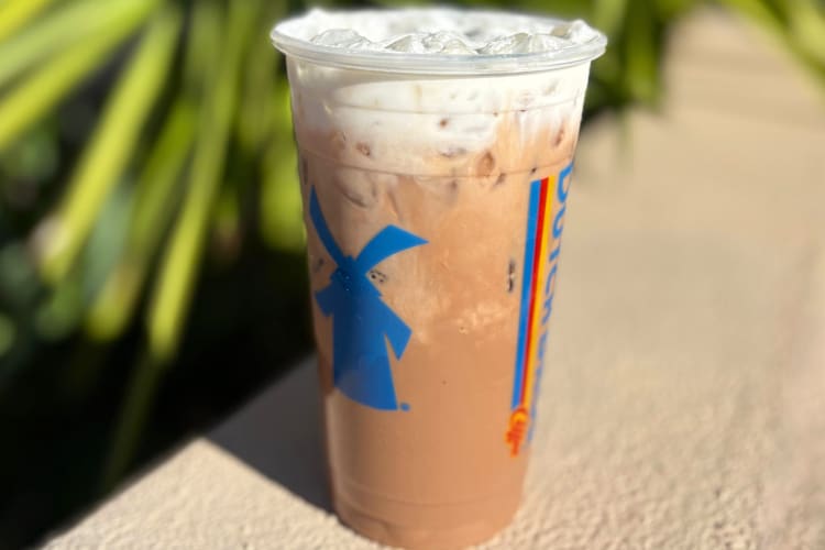 An iced coffee with whipped cream topping from Dutch Bros