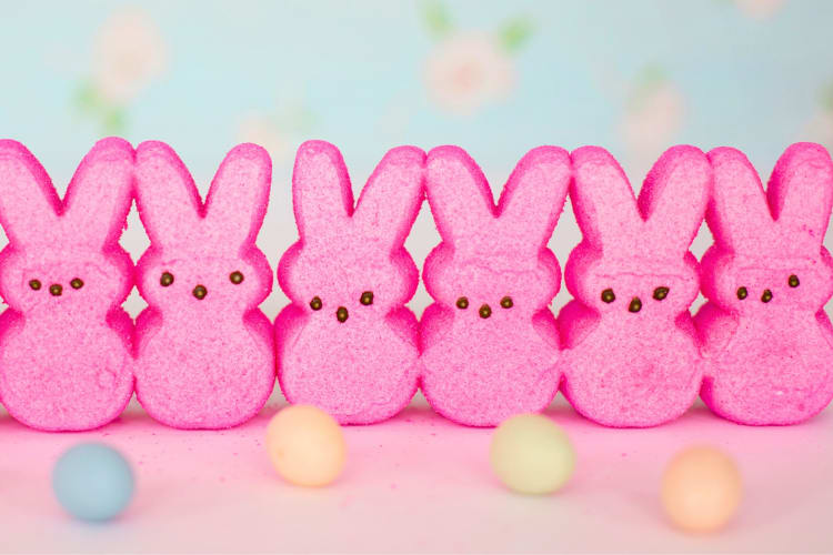 Pink rabbit-shaped marshmallows in a line