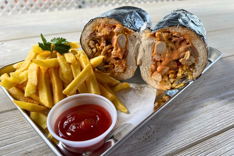 Meat sandwich and fries with ketchup from El Bori, a food truck in Miami