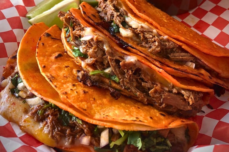 Three meat-based tortillas from El Fuego, a food truck in San Francisco
