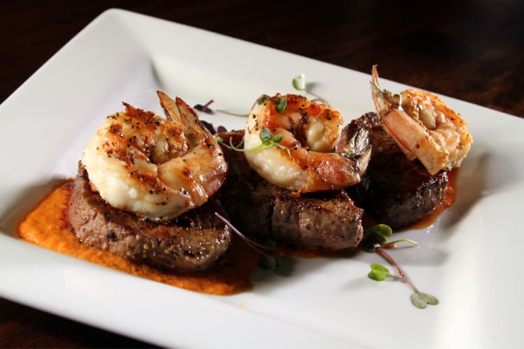 Surf and turf meal as an option showcasing the best steakhouses in NYC