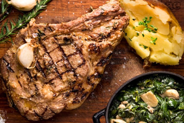 Steak, baked potato and spinach