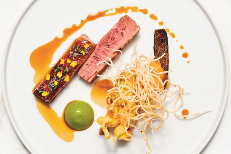 A high-end meat dish with pea puree 