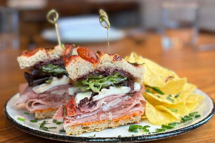 Sandwich meal with a side portion of crisps from Faccia a Faccia, one of Boston's most expensive restaurants