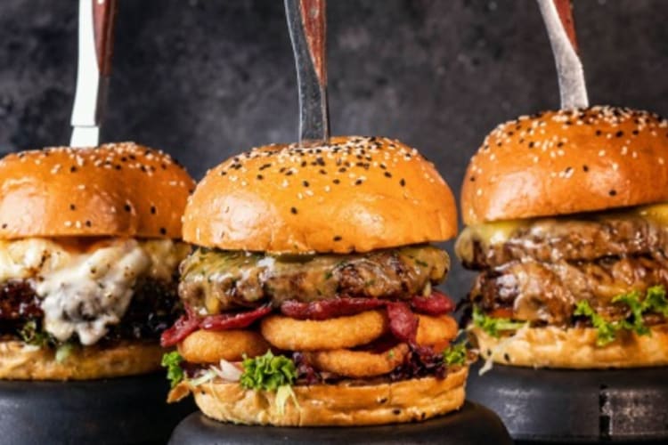 Three delicious The Grilll Shack burgers and fast food in Dubai