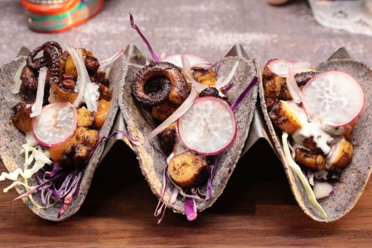 Three Mexican tacos at Maria Bonito Taco Shop & Grill in Dubai