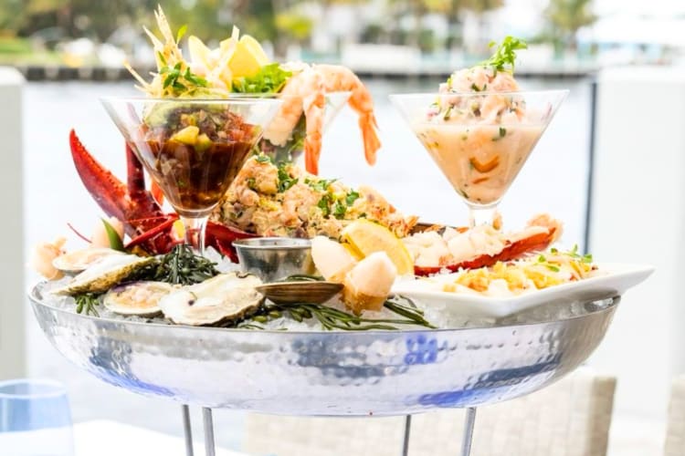 A seafood tower on an outdoor table