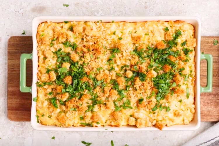 A dish with mac and cheese topped with breadcrumbs