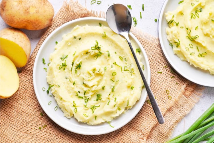Two bowls of mashed potatoes