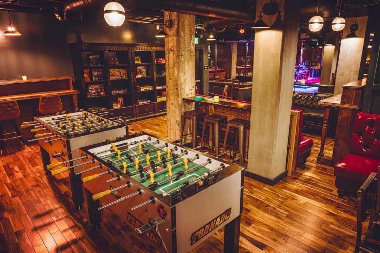 Playing games at a bar is a fun date idea in Los Angeles