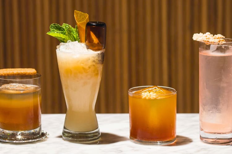Different gourmet cocktails on a table