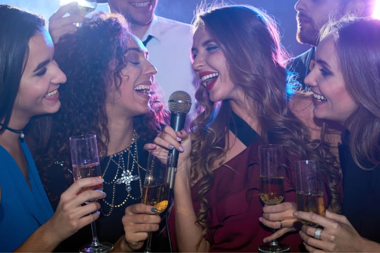 Singing karaoke together is a fun Galentine's Day idea