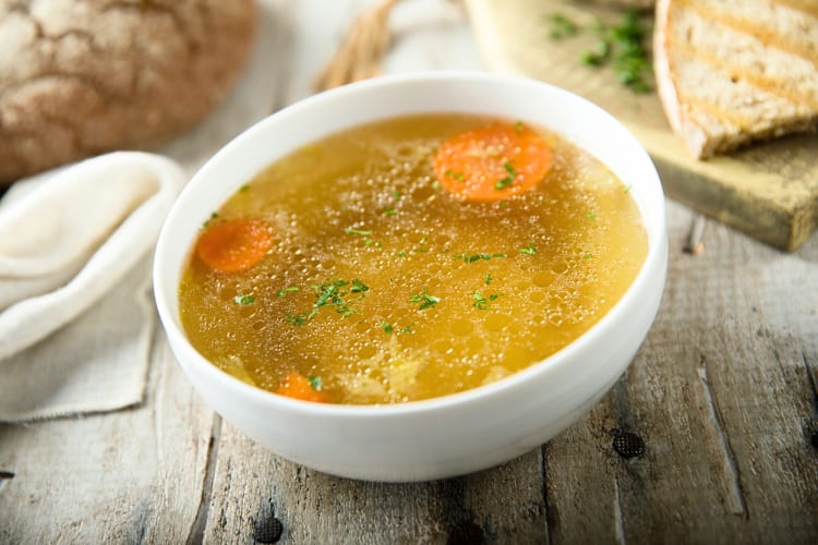 Broth in a white bowl