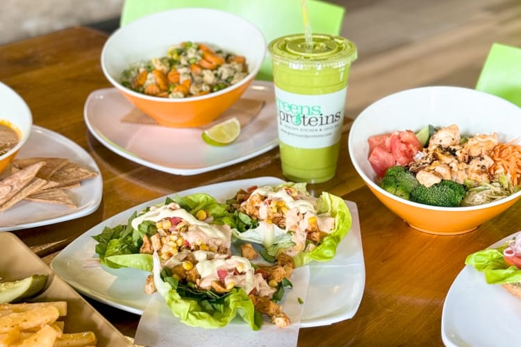A selection of healthy dishes and a green smoothie