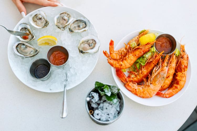 Shrimp and oysters on a table