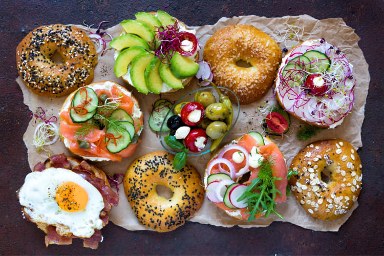 Bagels with various healthy toppings 
