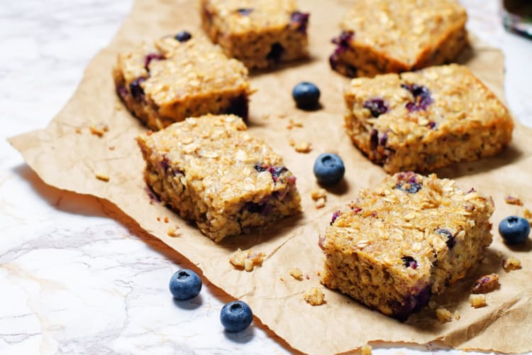 Blueberry oatmeal bars on parchment paper