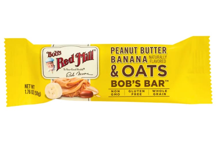 A yellow Bob’s Red Mill Peanut Butter, Banana and Oats Bar