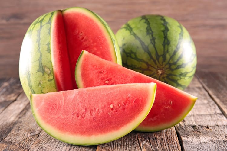 Whole watermelon and watermelon slices