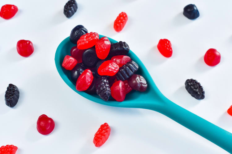 Fruit snacks in a turquoise spoon
