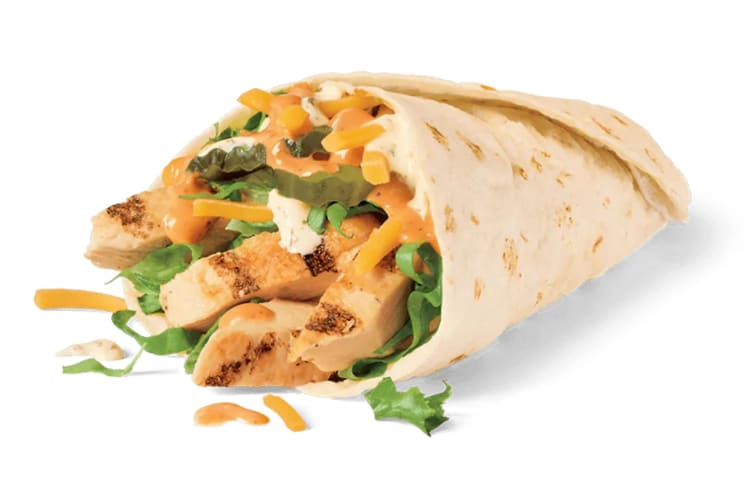 Grilled chicken strips, shredded lettuce, shredded cheddar, pickles in a wrap.