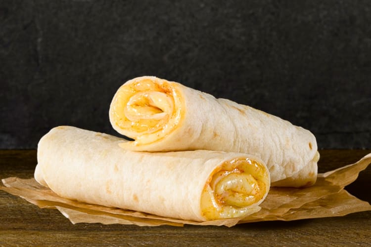 Flour tortillas rolled with melted cheese