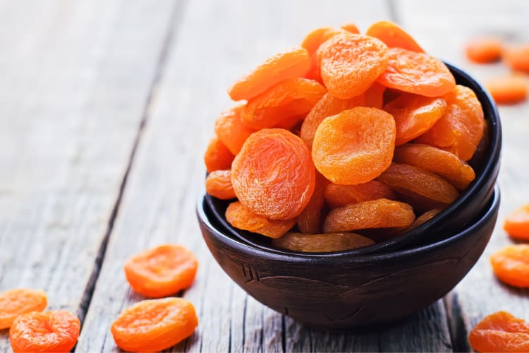 A bowl with dried apricots